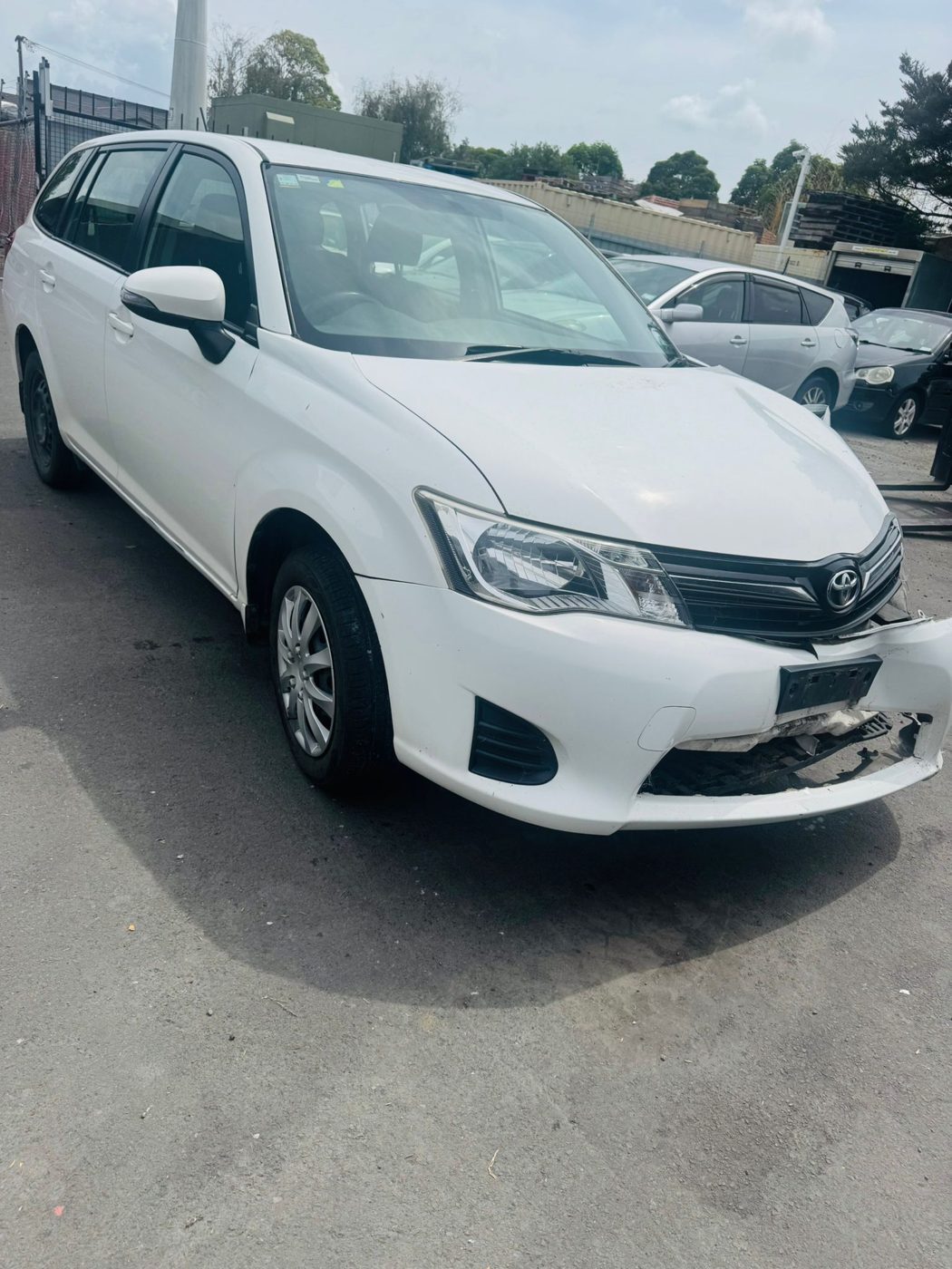 White Toyota Corolla Fielder wagon bought for cash in Auckland