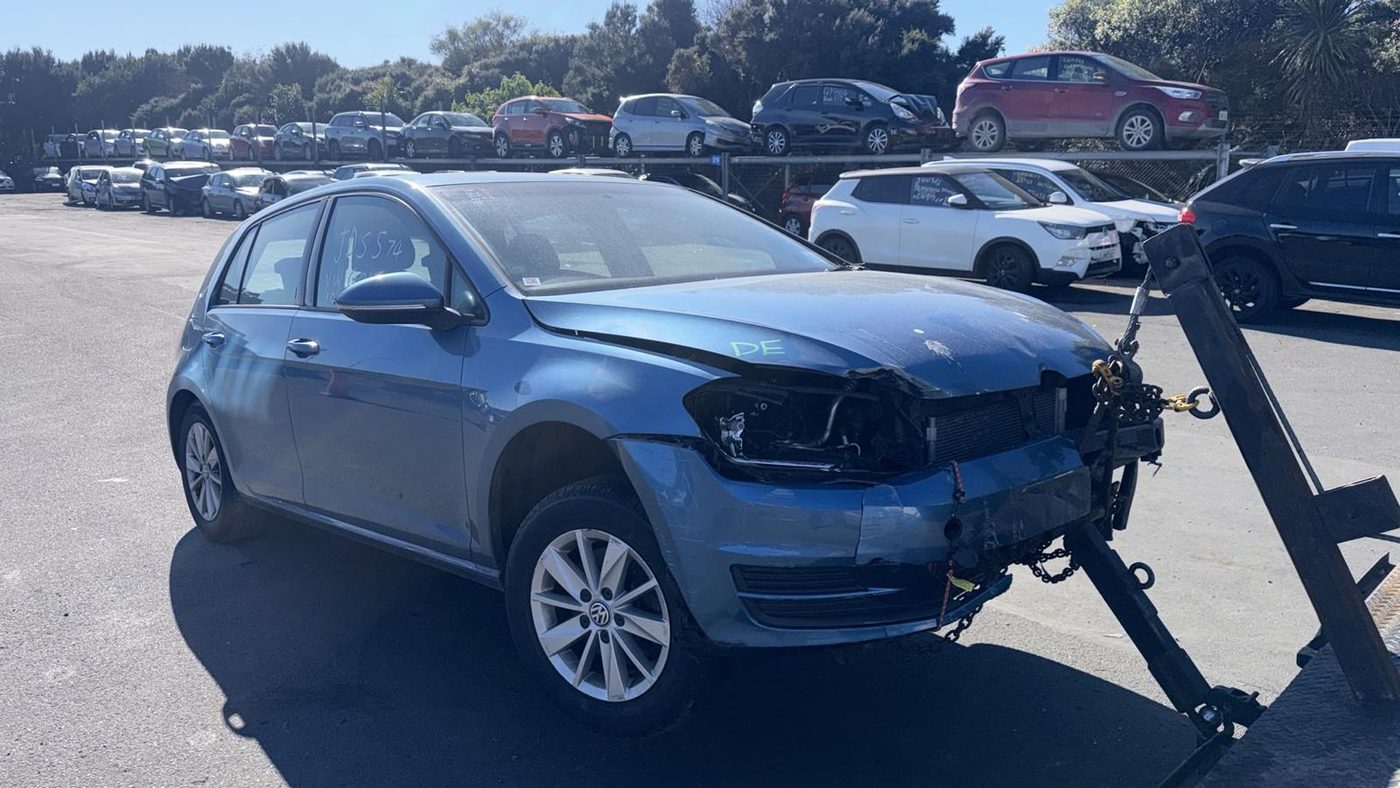 Accident-damaged VW Golf collected for cash in Auckland